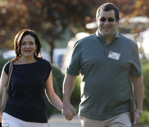 Lucky escape: Sheryl Sandberg, COO of Facebook, pictured on Wednesday - just days after she switched her flights and avoided boarding the doomed Asiana plane. She is with her husband David Goldberg